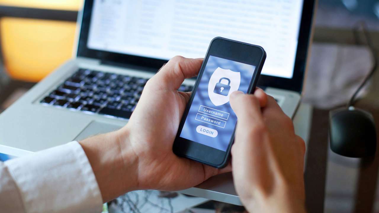 A person logging into a secure app on their phone