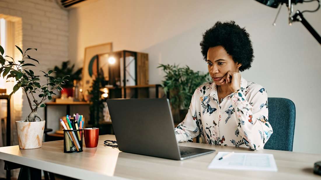 woman-frustrated-on-laptop-with-malware