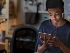 teen-boy-being-cyberbullied-on-tablet
