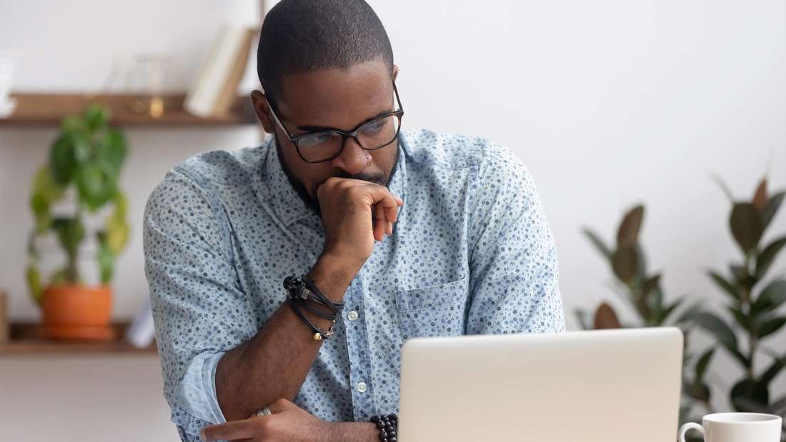 distressed-man-on-laptop