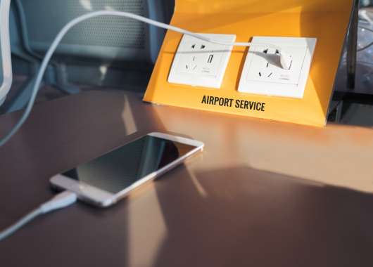 Picture os a phone charging from a public USB station