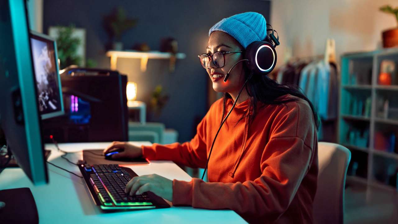 A person using their gaming PC setup