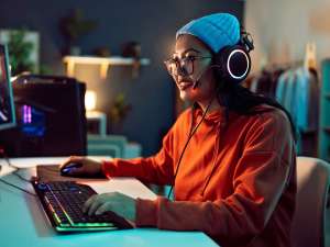 A person using their gaming PC setup