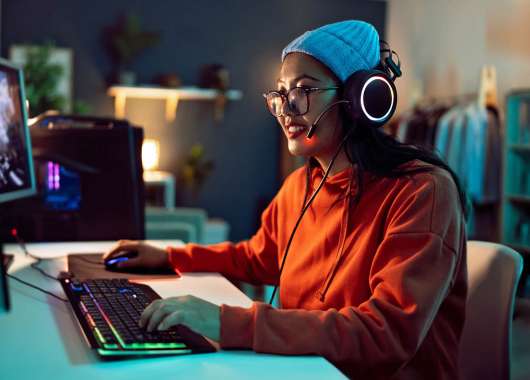 A person using their gaming PC setup