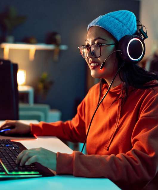 A person using their gaming PC setup