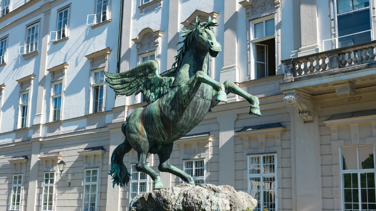 A pegasus statue outdoors.
