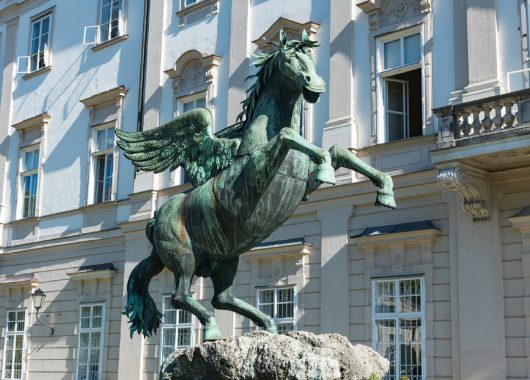 A pegasus statue outdoors.
