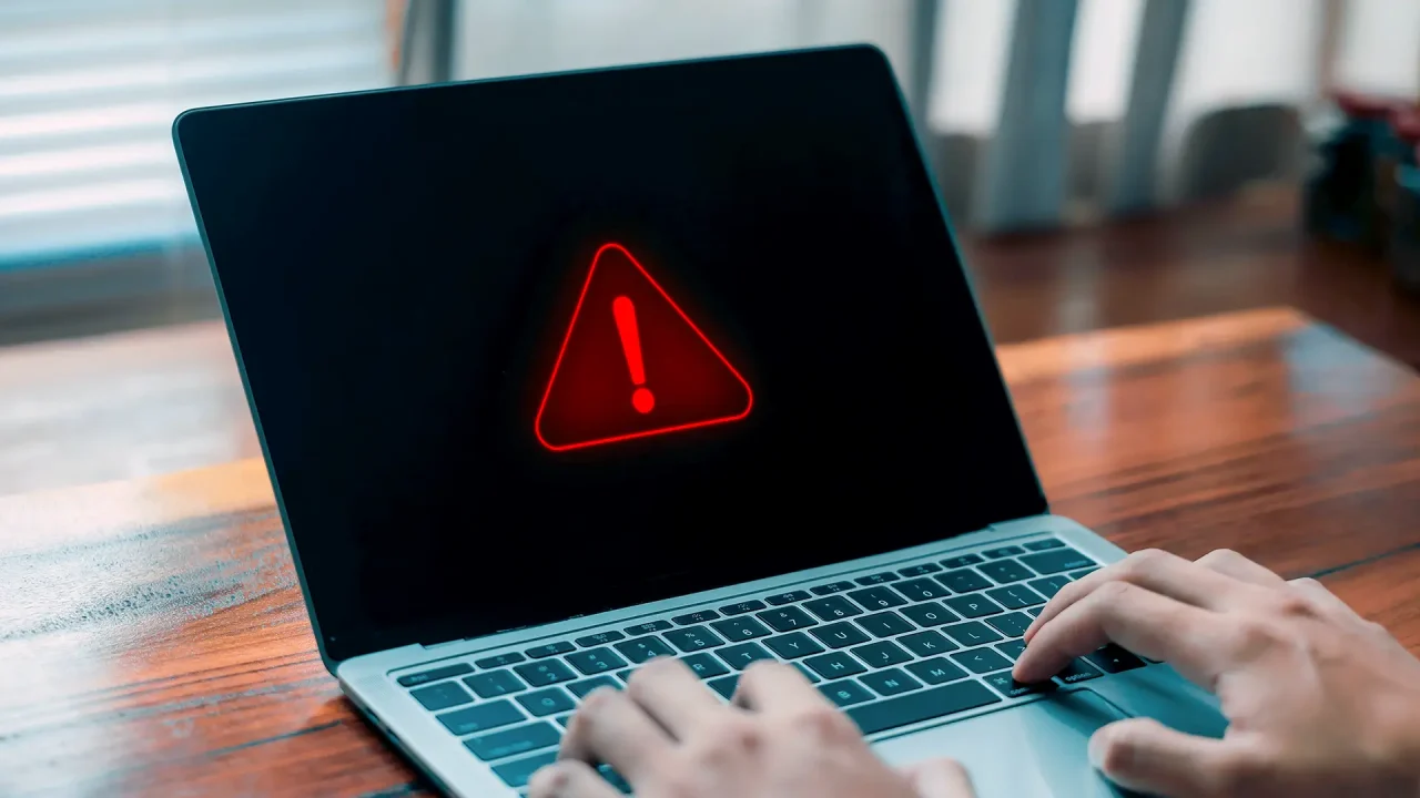 Rootkit warning signal on a laptop.