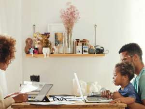 mother-father-and-son-on-computer-at-table